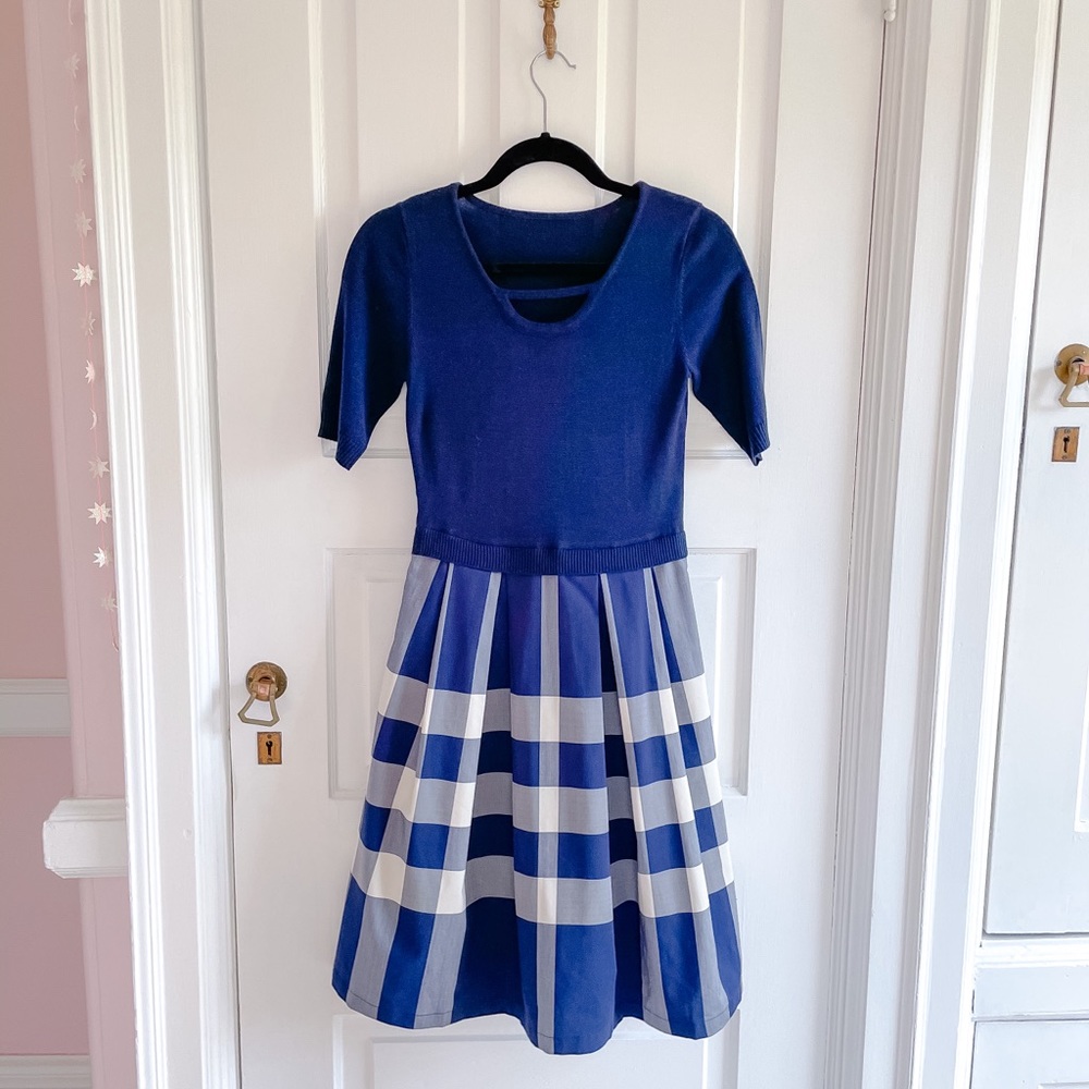 Sweater dress with plaid skirt